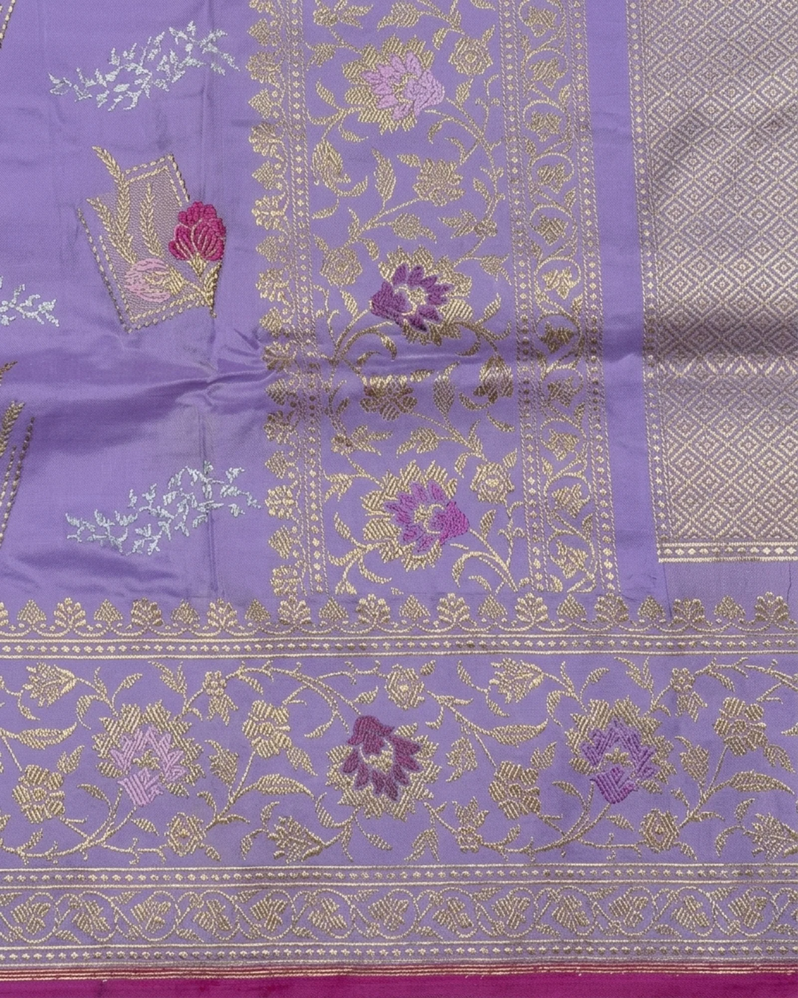 Close-up of Champagne Gold Zari floral border and Meenakari motifs