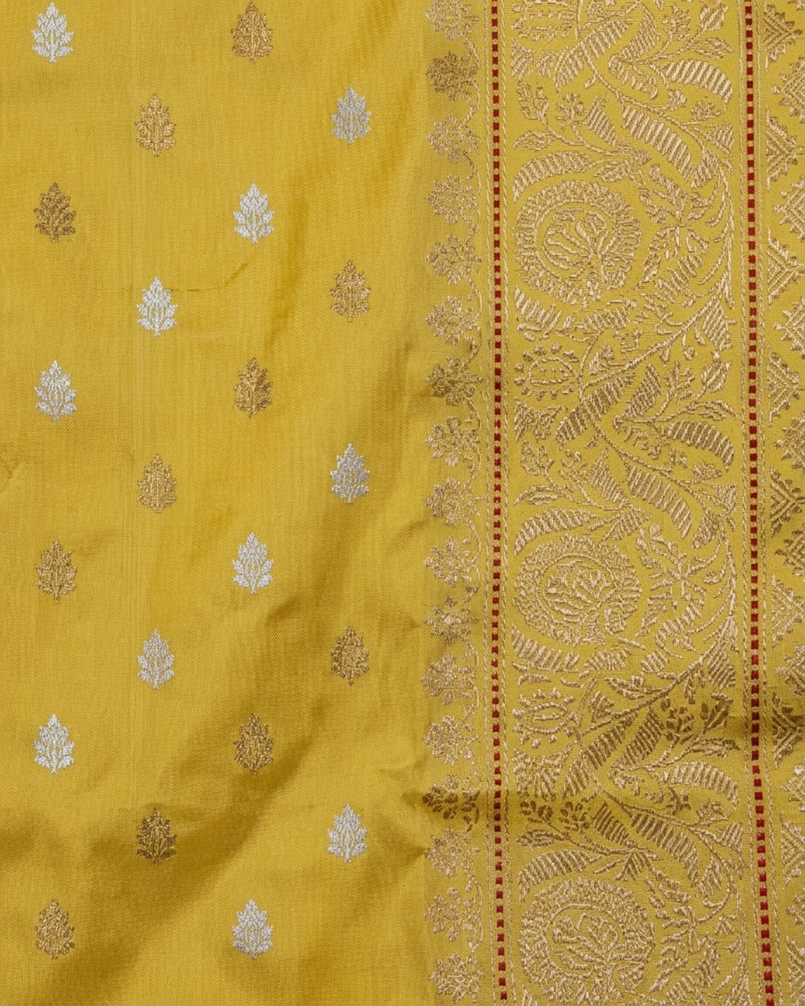 Close-up of Sona Rupa floral butis and broad Gold Zari border